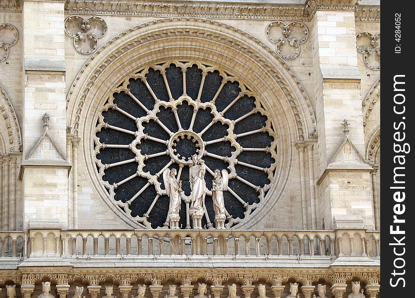 Beautiful church window on the Notre Dame cathedral in Paris.