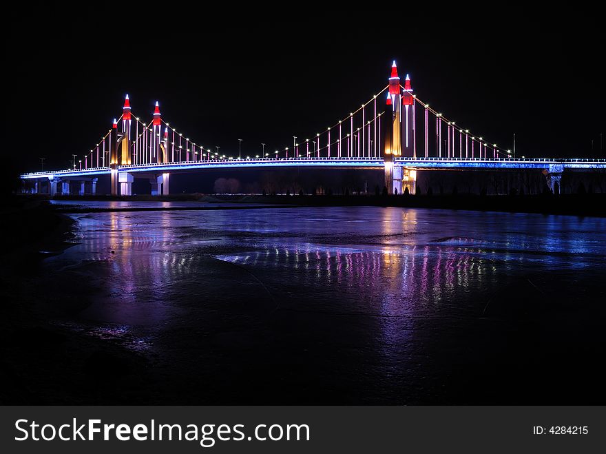 A bridge which is loca in beijing China with light. A bridge which is loca in beijing China with light