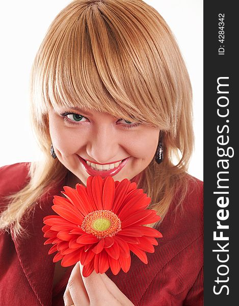 Smiling girl with red flowers