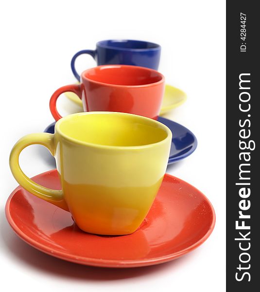 An image of color cups and saucers