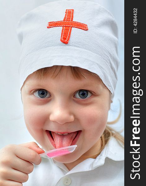 An image of child playing a doctor. An image of child playing a doctor
