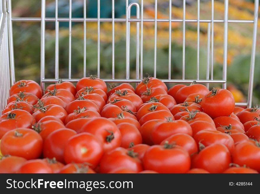 Tomatoes on display in a market