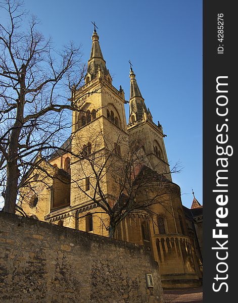 Catholic cathedral in evening light. Vertical. Neuchatel, Switzerland. Catholic cathedral in evening light. Vertical. Neuchatel, Switzerland.