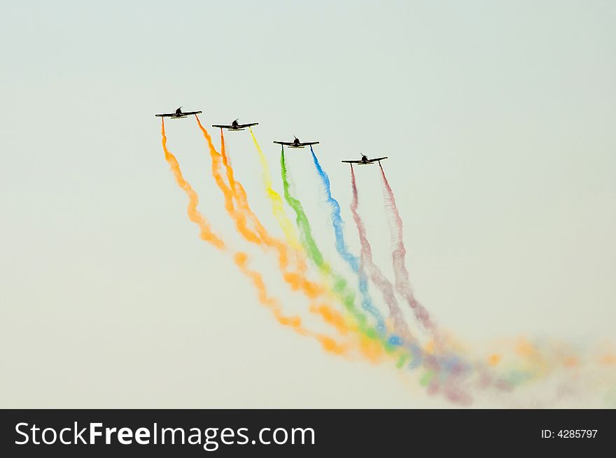 A group of aerobatic pilot show their smoke in different colors during their show at the Al Ain Aerobatic Show 2008. A group of aerobatic pilot show their smoke in different colors during their show at the Al Ain Aerobatic Show 2008