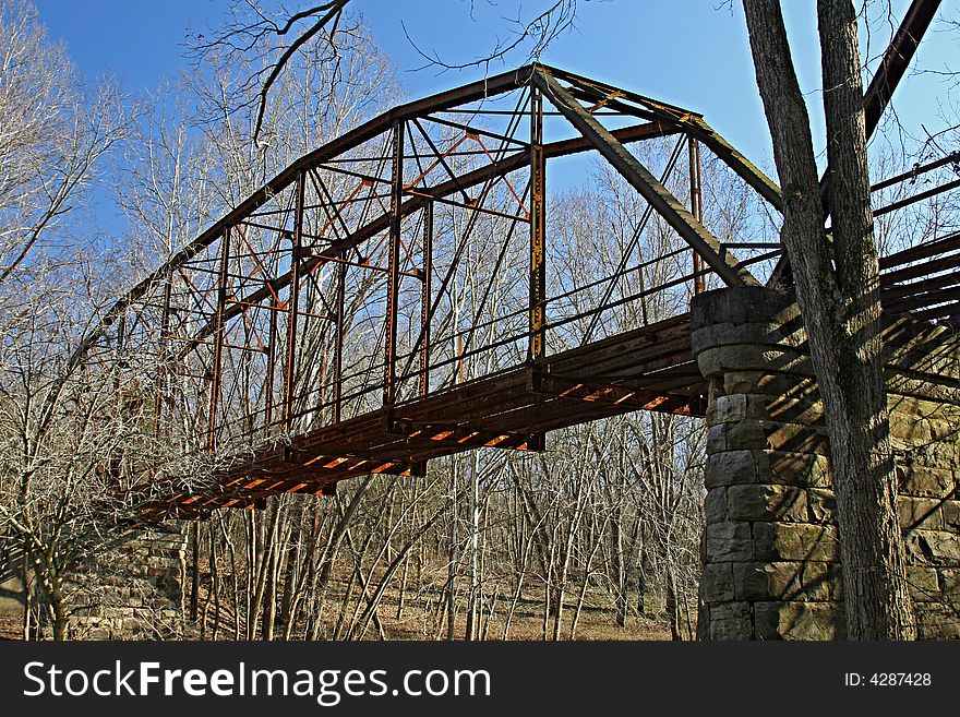 An old iron bridge over a river