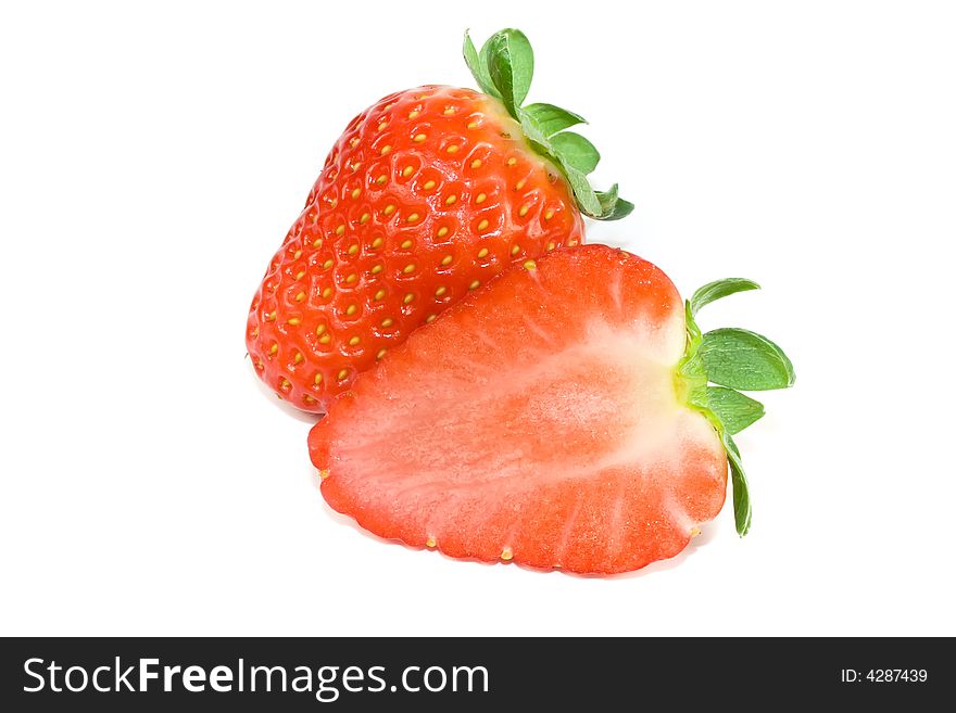 Strawberries closeup isolated on white
