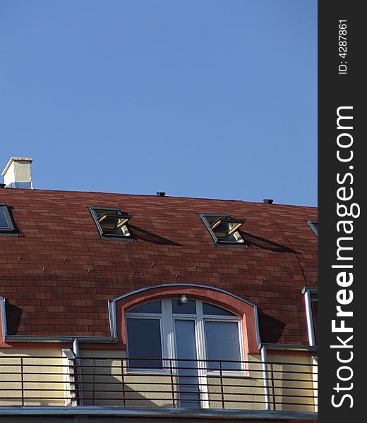 Roof on sunny day in the blue sky