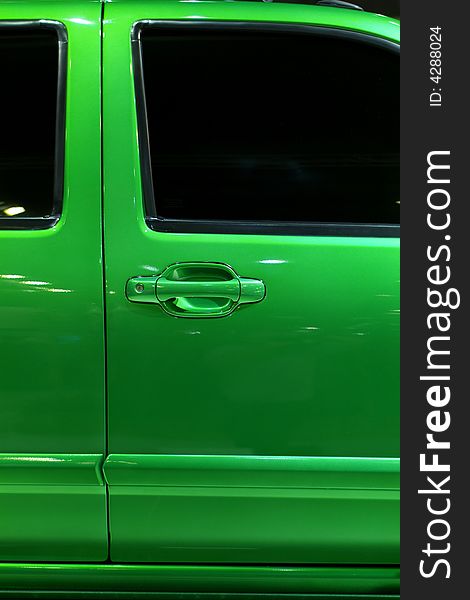 Door of green pickup truck