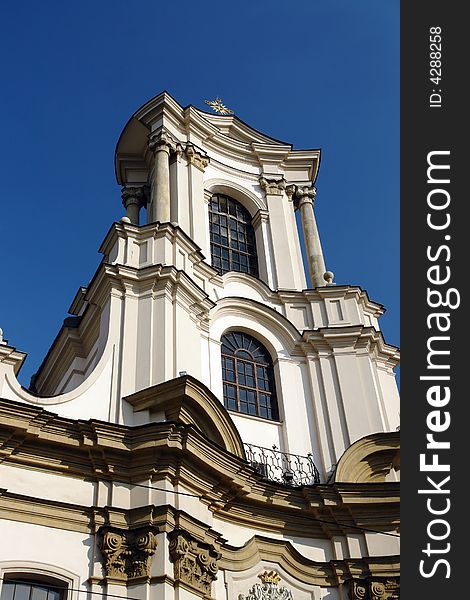 Facade of baroque church of order of the Brothers of St John of God in Krakow, Poland. Facade of baroque church of order of the Brothers of St John of God in Krakow, Poland