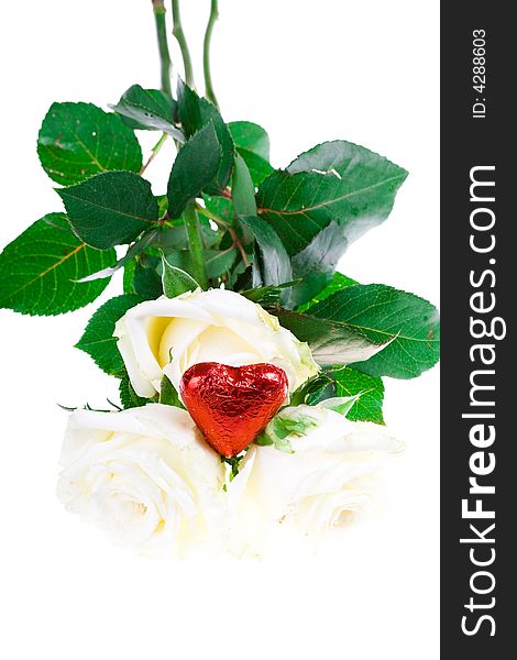 Rose with a red heart  on a white background (isolated). Rose with a red heart  on a white background (isolated)