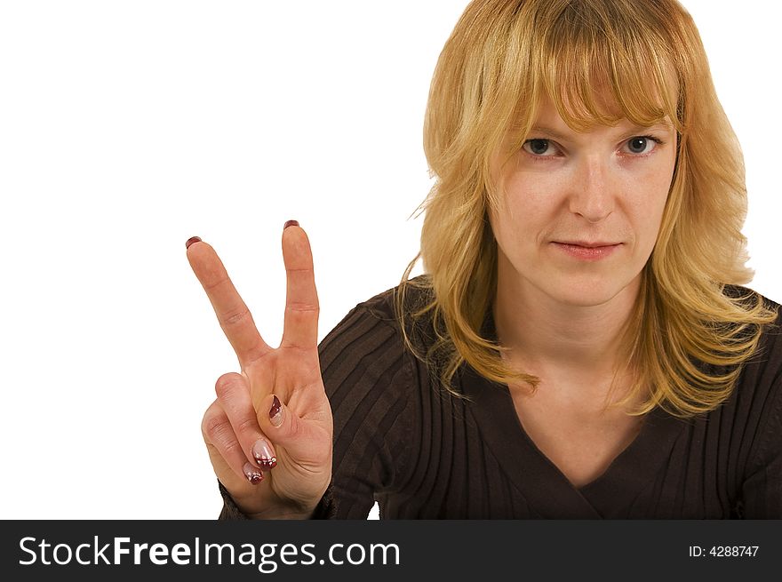 Blond woman showing a peace sign with fingers. Blond woman showing a peace sign with fingers