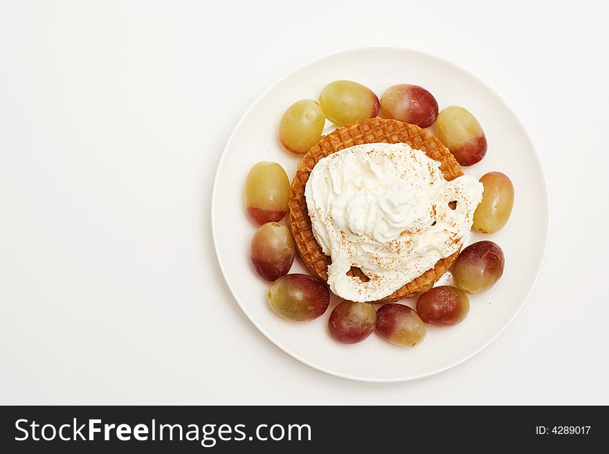 Sweet breakfast with cream and grapes. Sweet breakfast with cream and grapes.