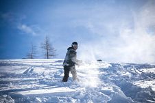 The Snowboarder Riding On A Virgin Soil Stock Photos The Snowboarder Riding On A Virgin Soil Stock Photos