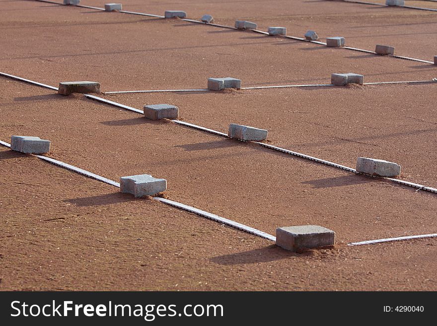 Tennis court off season with covered lines