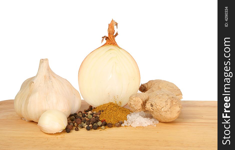 Curry ingredients laid out on a wooden board