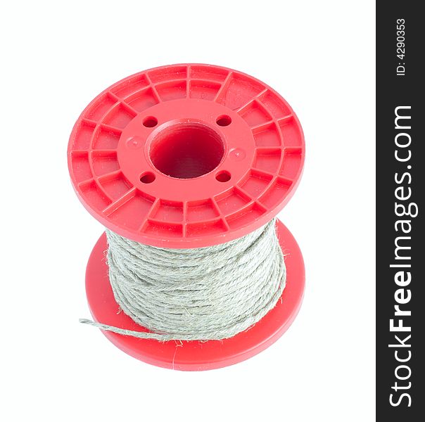 String on the red plastic spool