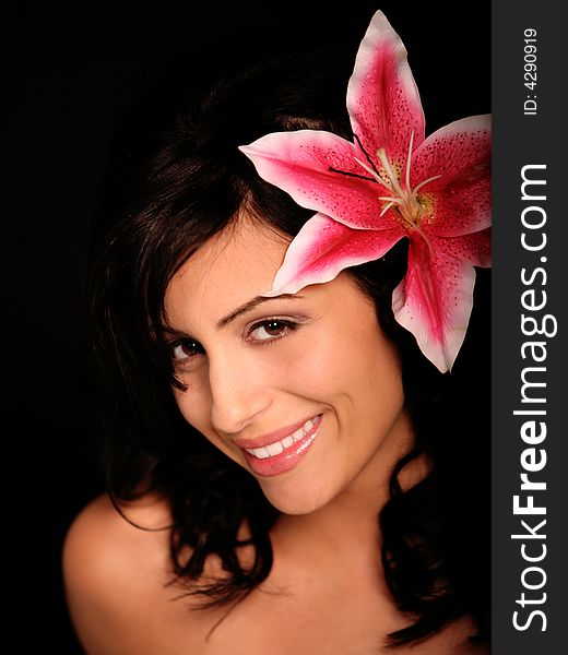 Beautiful Happy Italian Woman with natural make-up and Flower. Beautiful Happy Italian Woman with natural make-up and Flower
