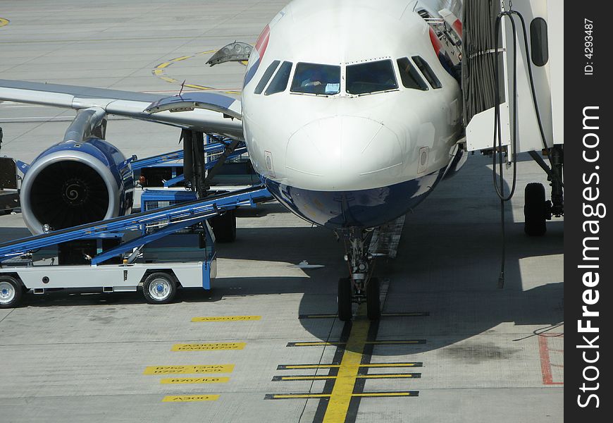 Close up view of an airliner being prepared for takeoff. Close up view of an airliner being prepared for takeoff