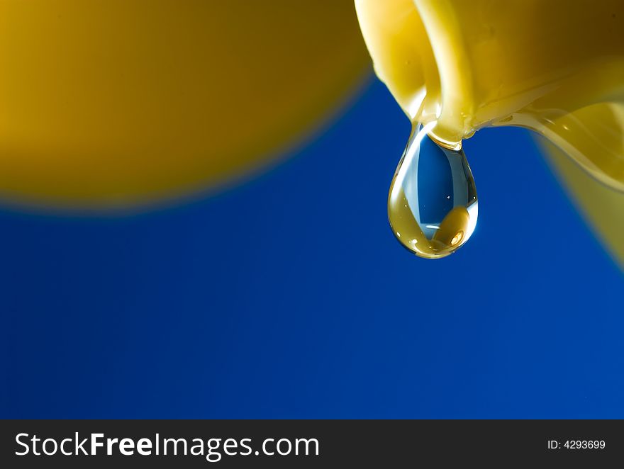 Honey pouring from a bottle. Honey pouring from a bottle