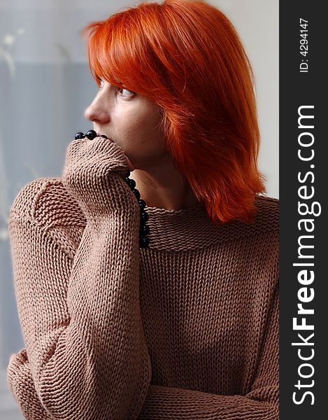 Closeup portrait of a fresh-faced natural woman, young and pretty, with red hair and freckles . Closeup portrait of a fresh-faced natural woman, young and pretty, with red hair and freckles .