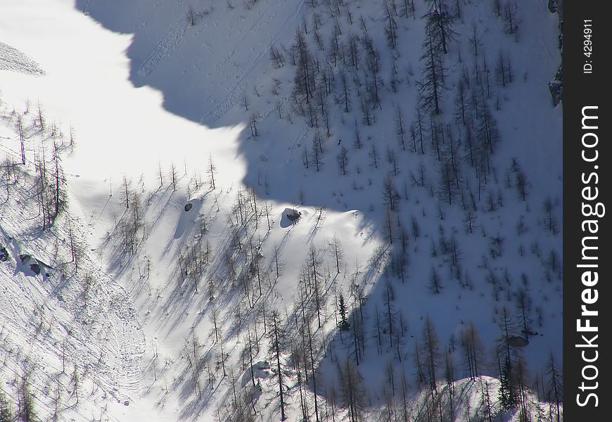 Trails of the avalanches on snow slopes in the Alps. Trails of the avalanches on snow slopes in the Alps