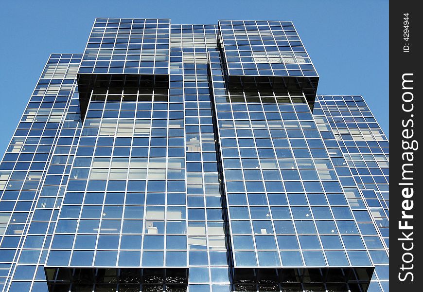 Looking up at a modern office block in London. Looking up at a modern office block in London