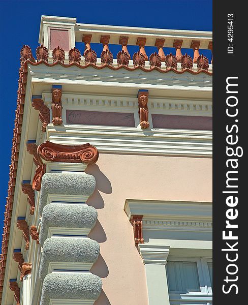 Decorative old building with parrpit wall in sunny Santorini. Decorative old building with parrpit wall in sunny Santorini
