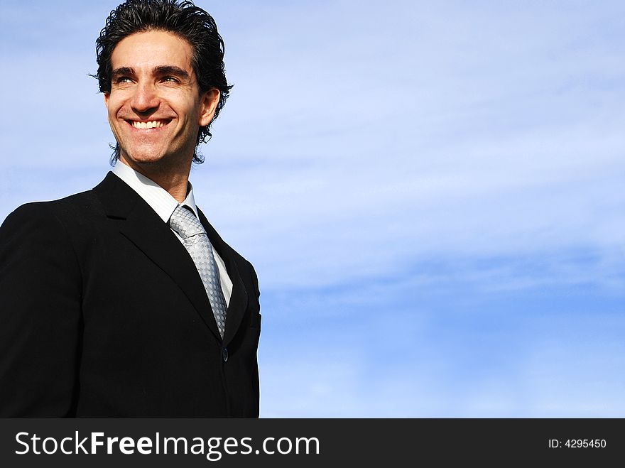 Confident and successful young adult businessman