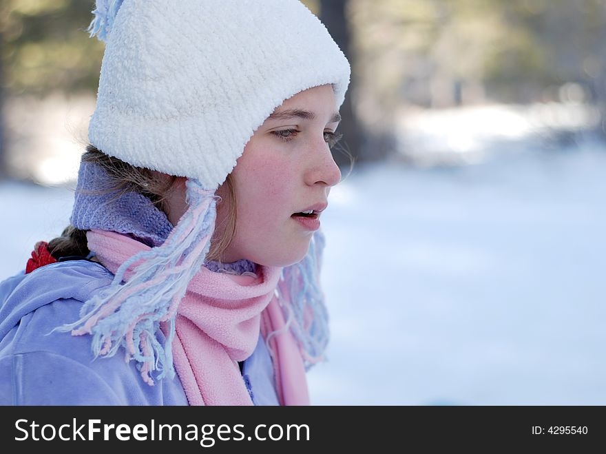 Young girl is playing in the snow. Young girl is playing in the snow