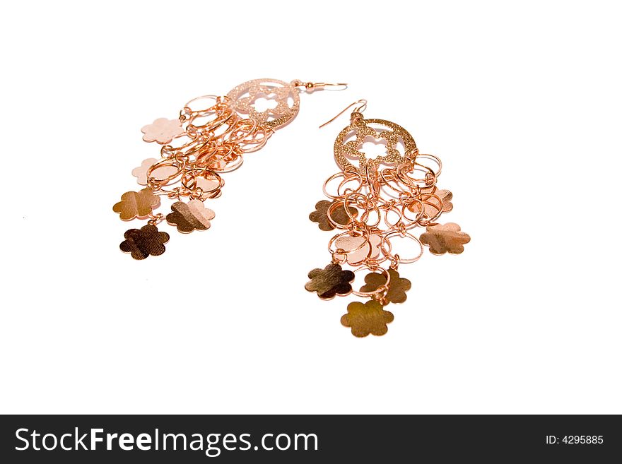 Golden Ear-rings On The White Isolated Background