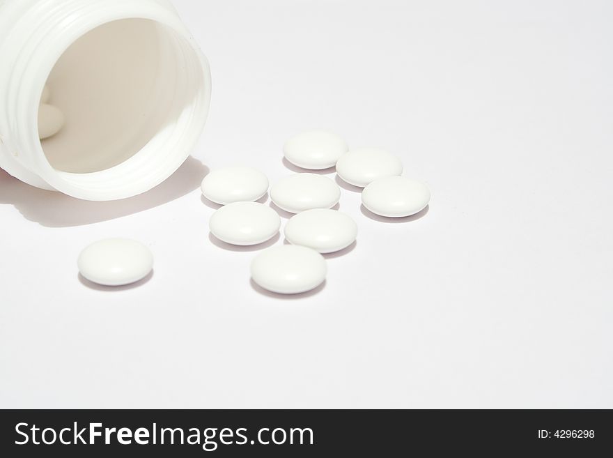 Tablets on white background