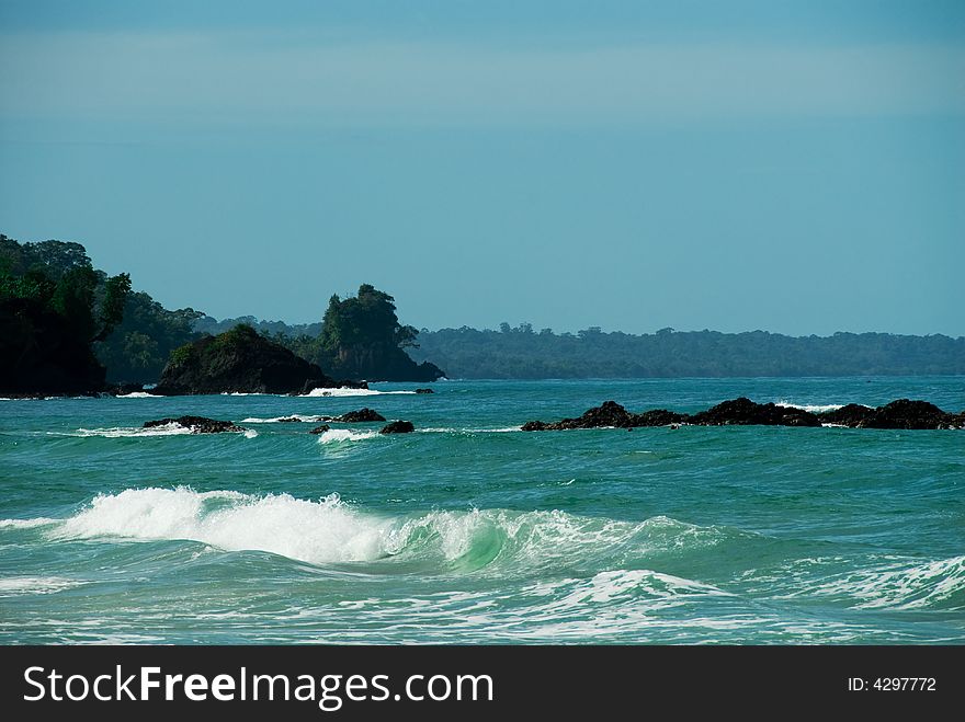 Tropical beach in panama with some waves crashing