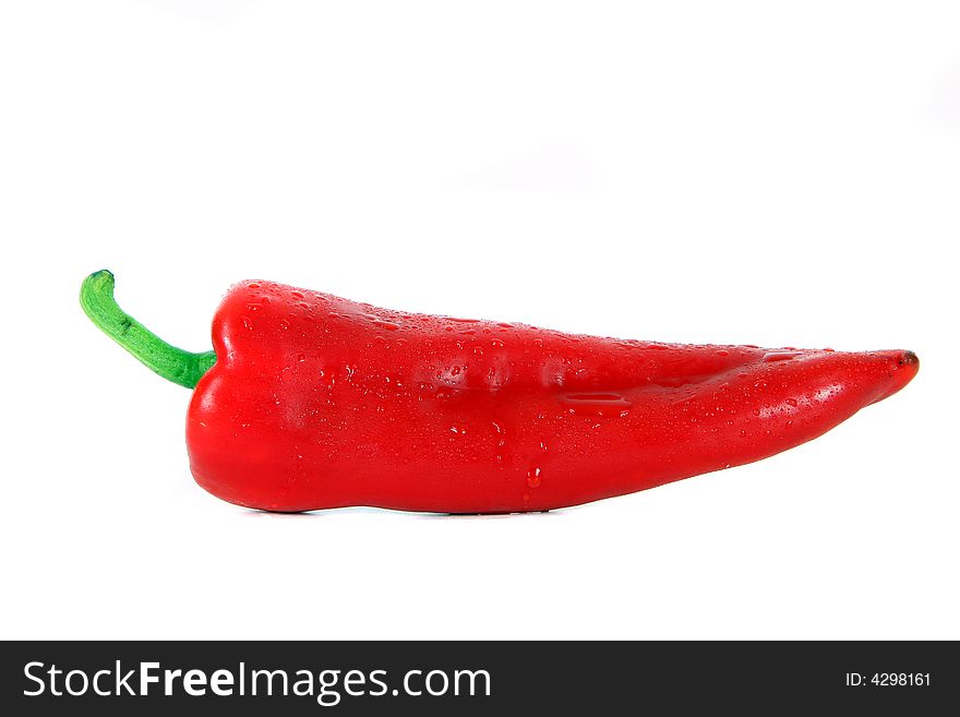 Shot of red pepper with waterdrops on it - over white background. Shot of red pepper with waterdrops on it - over white background.