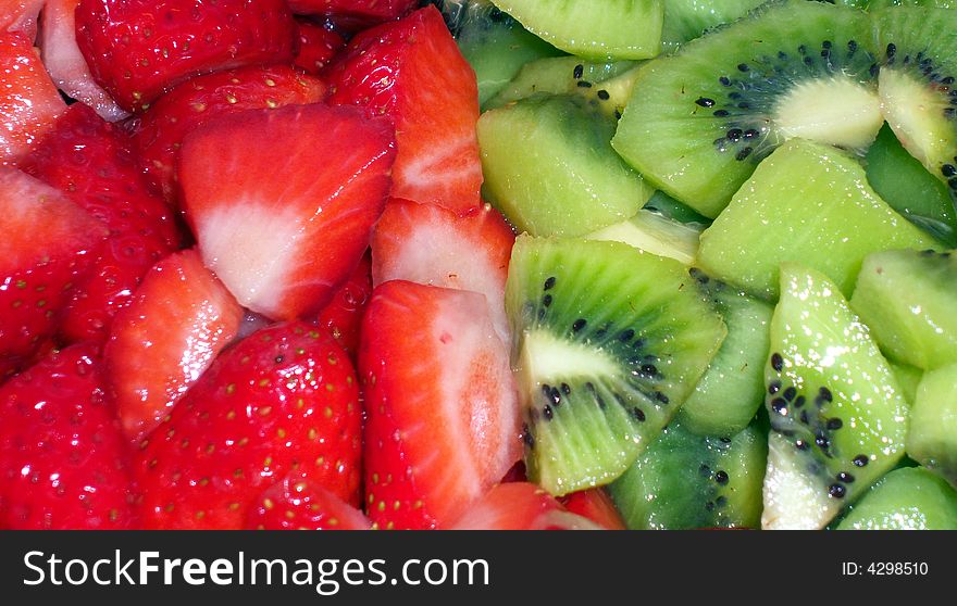 A fresh fruit salad, with kiwi and strawberry. A fresh fruit salad, with kiwi and strawberry