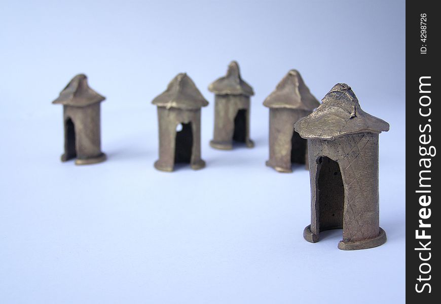African statues of cottages made of brass. African statues of cottages made of brass