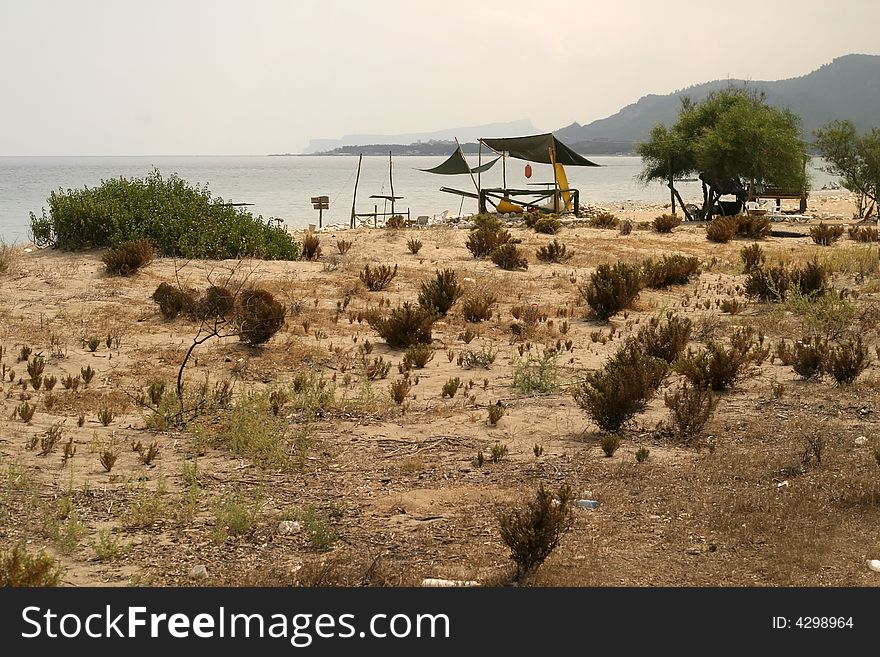 Vicinities of sea coast and wild bivouac camp on seacoast. Vicinities of sea coast and wild bivouac camp on seacoast