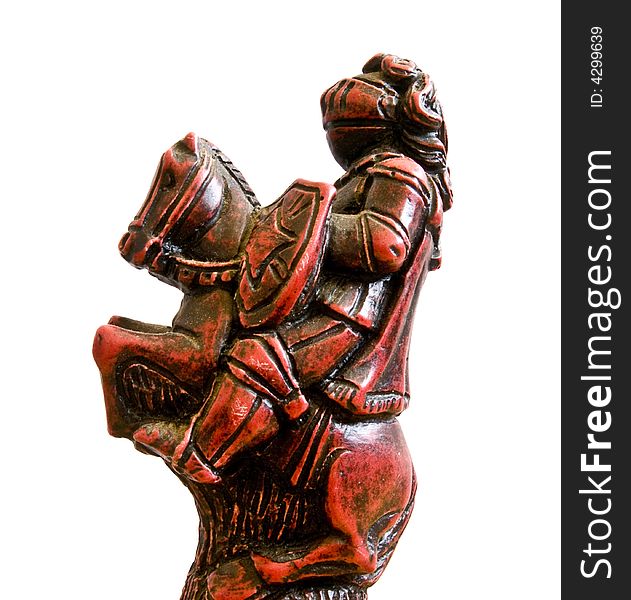 Close up of a red knight chess piece