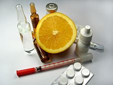 Orange Fruit Surrounded By Drugs, Pharmacy Pills Stock Photo Orange Fruit Surrounded By Drugs, Pharmacy Pills Stock Photo