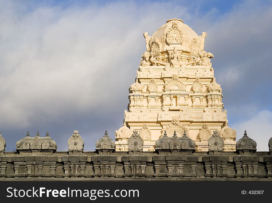 An ornate sculpture on the roof of an Indian temple. An ornate sculpture on the roof of an Indian temple