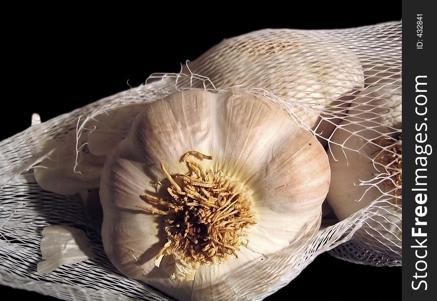 Cloves of Garlic in sack