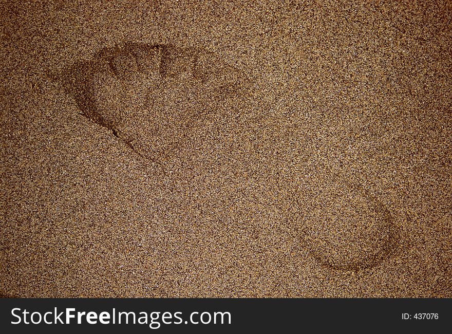 A footprint in the sand, Cornwall, England. A footprint in the sand, Cornwall, England