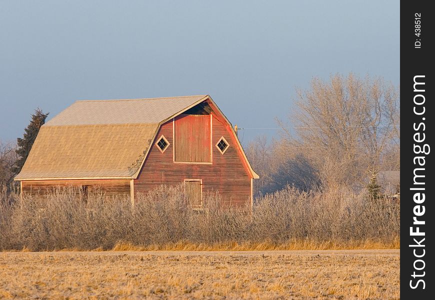 An aging barn set on the prairies.