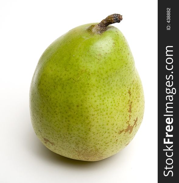 Close-up of a single green pear. Isolated.