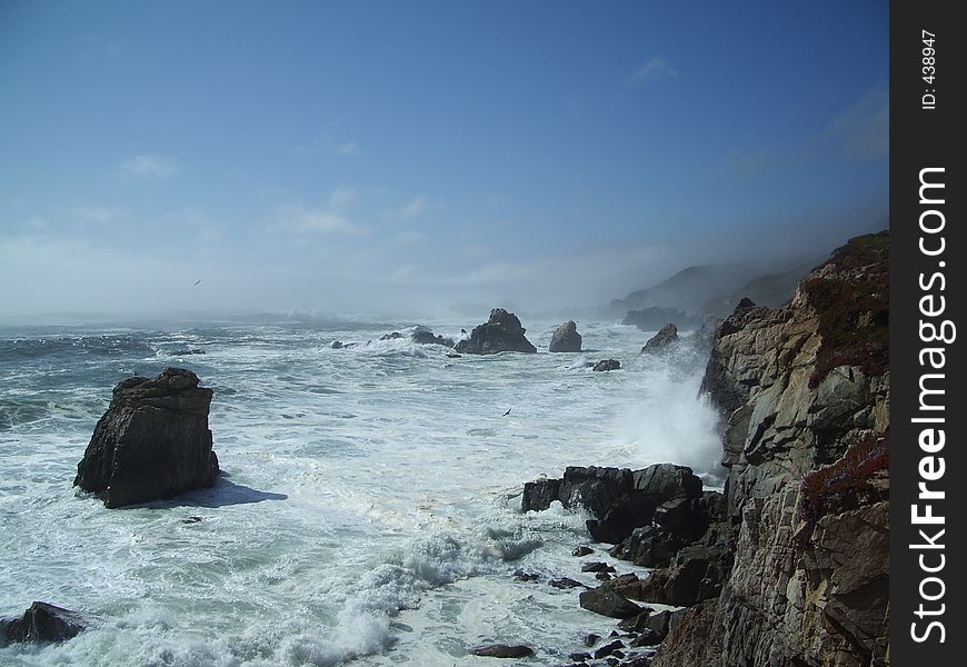 Waves Crashing into the Cliff