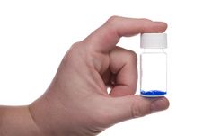 Hand With Blue Vial Stock Image Hand With Blue Vial Stock Image