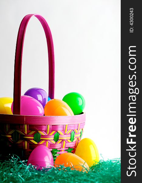 Easter egg basket with colored eggs. Easter egg basket with colored eggs
