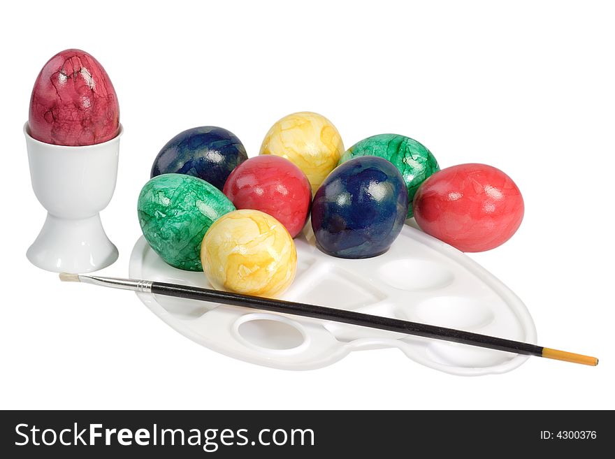 Painted easter eggs with painting implements - isolated on white. Painted easter eggs with painting implements - isolated on white