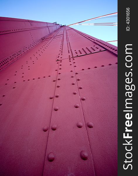 This is an unique photograph of the golden gate bridge.  This shows the rivets of the bridge in a bottoms up perspective with an ultra wide angle lens. This is an unique photograph of the golden gate bridge.  This shows the rivets of the bridge in a bottoms up perspective with an ultra wide angle lens.