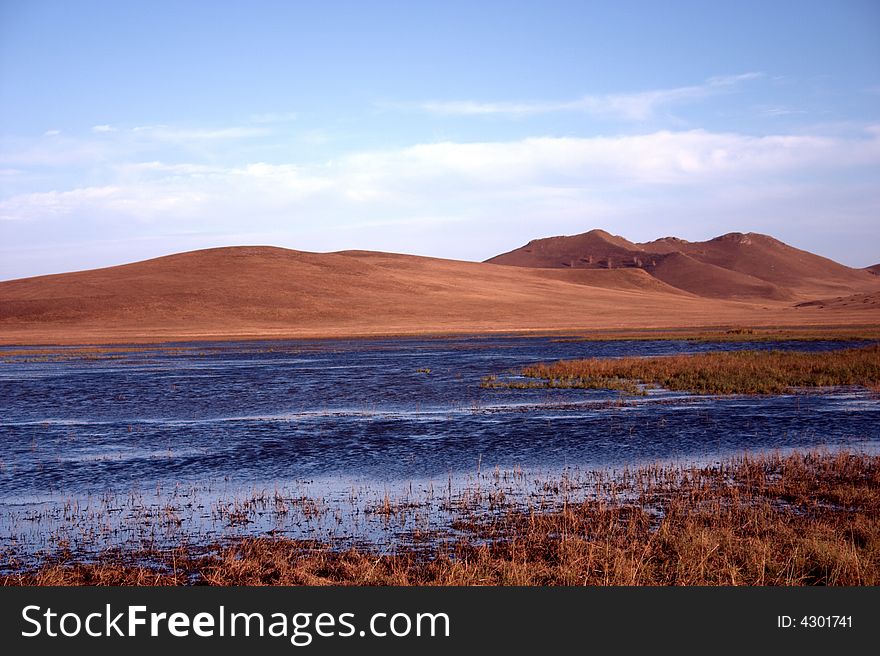 Taken at sunset by a small lake in grassland on inner Mongolia, China