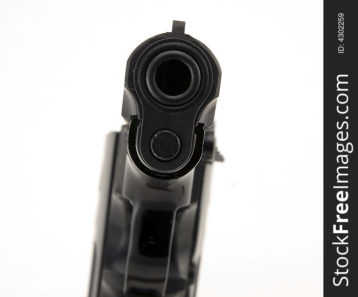 9mm pistol isolated on white background.